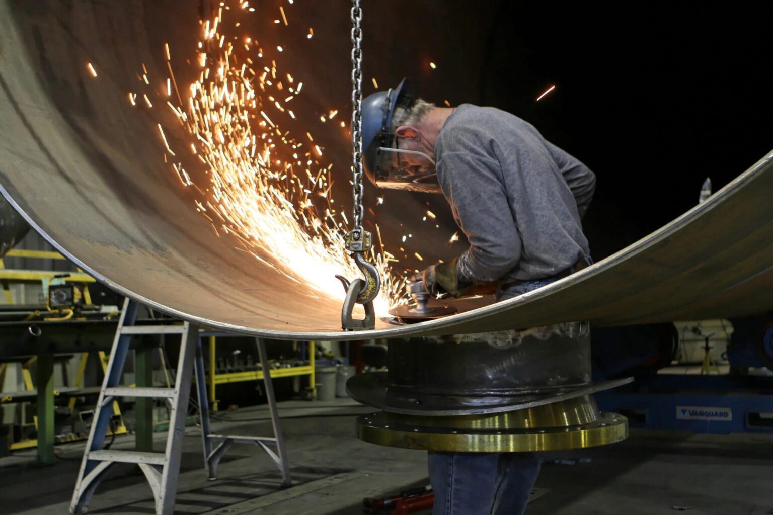 Man doing machine work without hearing protection