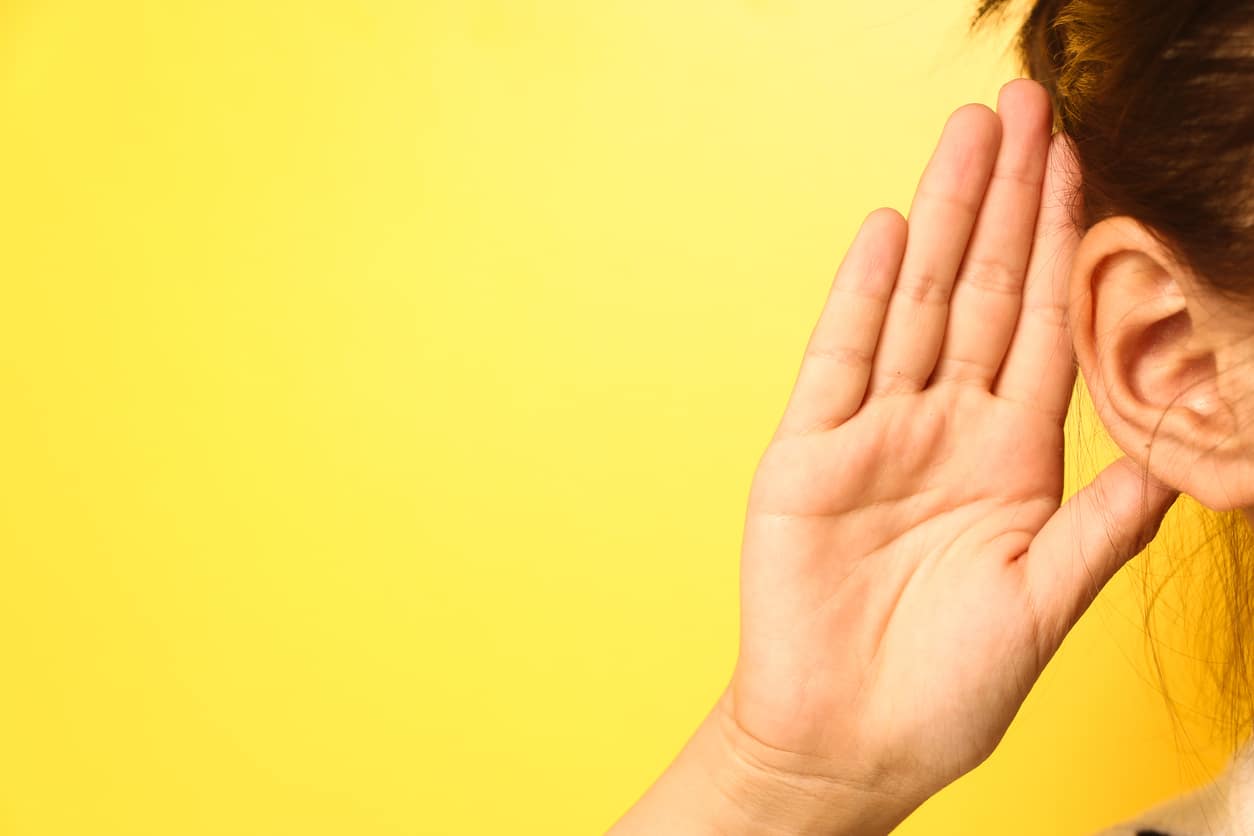 Hand to ear